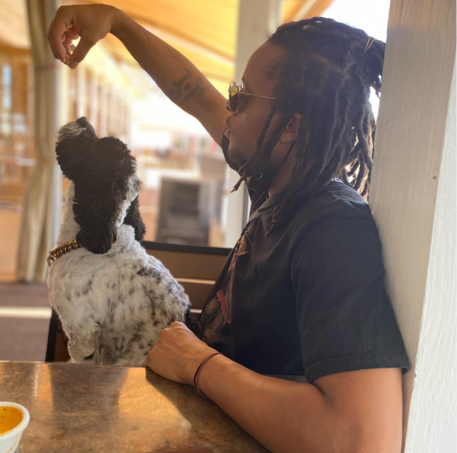 Akeem Alade with his dog